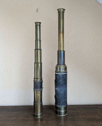 Two long telescopic brass sights.