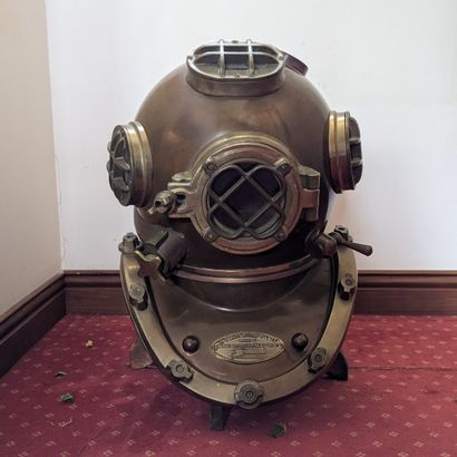 Copper and brass diving helmet. Marked 