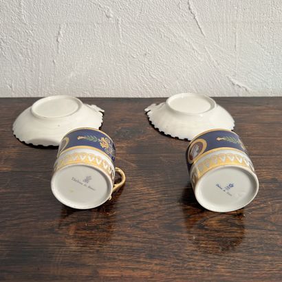 Pair of porcelain litron cups decorated with...