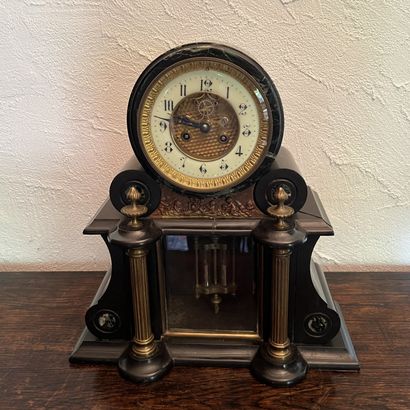 Boundary clock in black marble. The round...