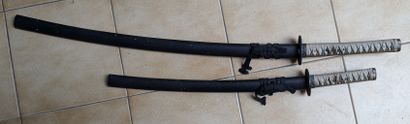 A modern katana and tanto. A cutter is i...