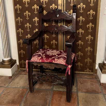 Fauteuil en bois naturel, le dossier à deux...