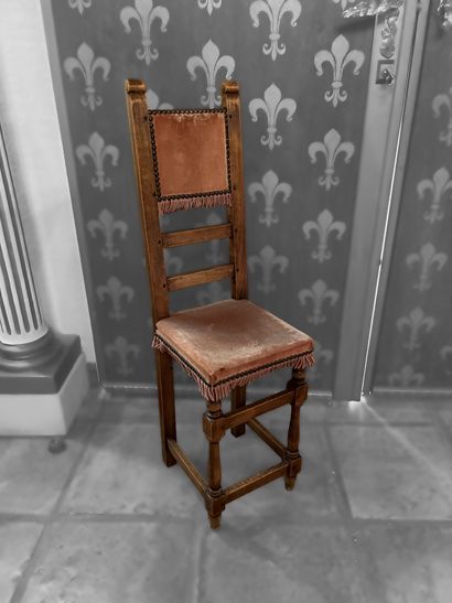 Fauteuil en bois naturel, le dossier à deux...