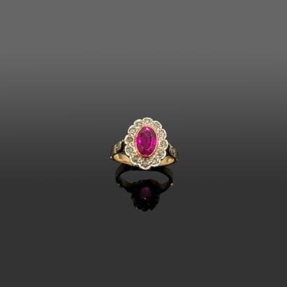 Bague en or jaune et or gris 18K (750), ornée...