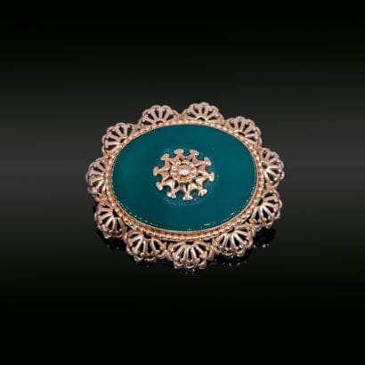 Broche en or jaune 18K (750), la monture...