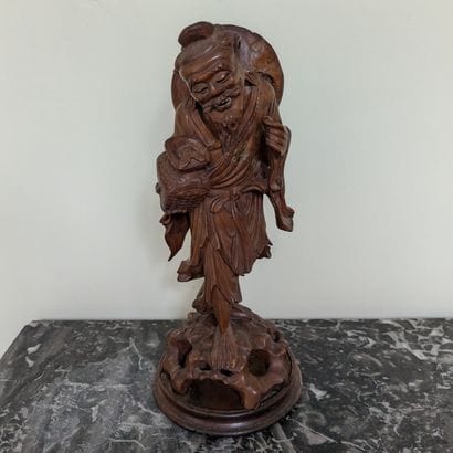 Pêcheur. Sculpture en bois exotique. Travail...