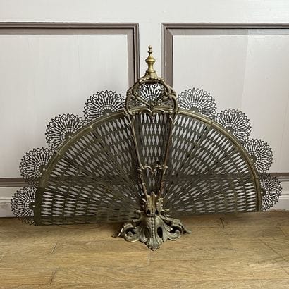 Ecran de foyer en bronze et laiton, la feuille...