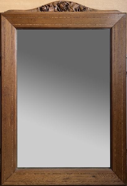Miroir à entourage en chêne marqueté de filets,...