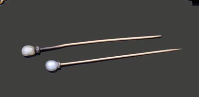 Two 18K (750) yellow gold tie pins, each...