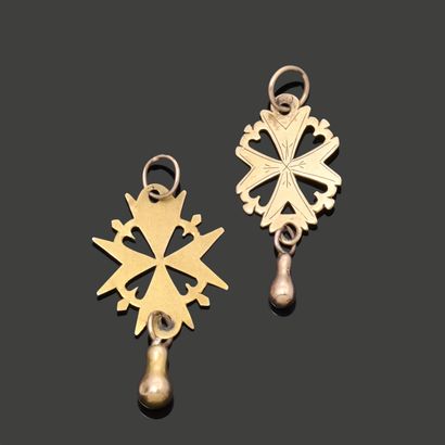 Two Protestant crosses in 18K (750) yellow...