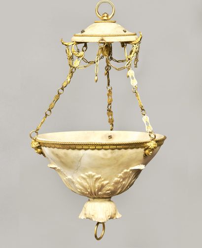 Alabaster and gilt bronze pendant. The attachment...