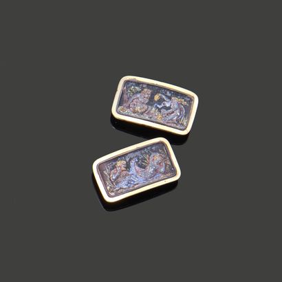Pair of buttons, set in 18K (750) yellow...