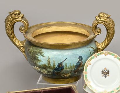 Large terracotta bowl painted with birds...