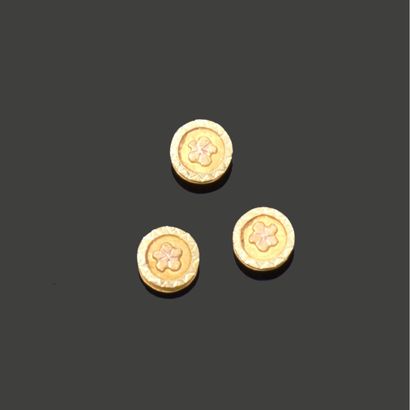 Three small collar or breastplate buttons...