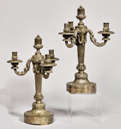 Pair of large silvered bronze torches, chased...