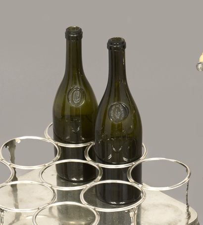 Two bottles in tinted blown glass, one with...