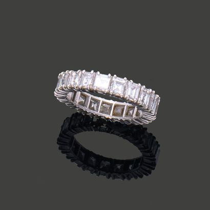 American wedding band in platinum, set with...