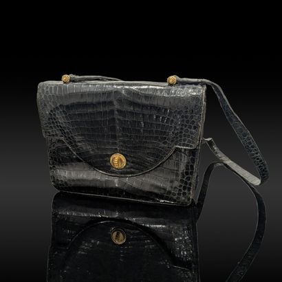 HERMES Paris. Black patent crocodile leather...