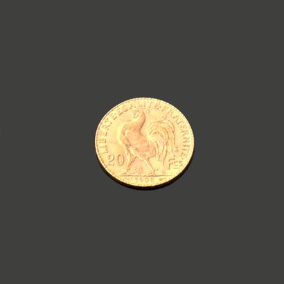 FRANCE. Pièce de vingt francs en or jaune....