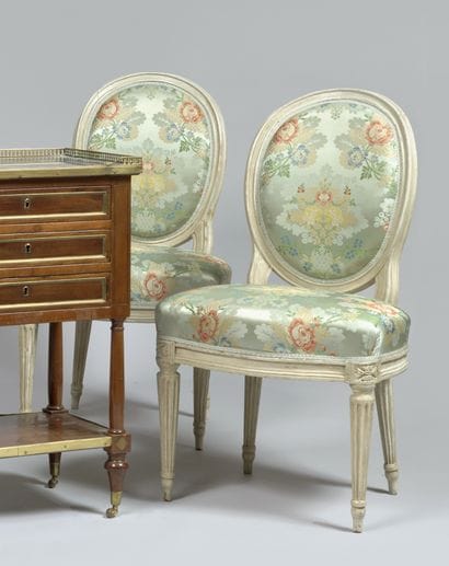 Pair of chairs in cream lacquered wood, cabriolet...