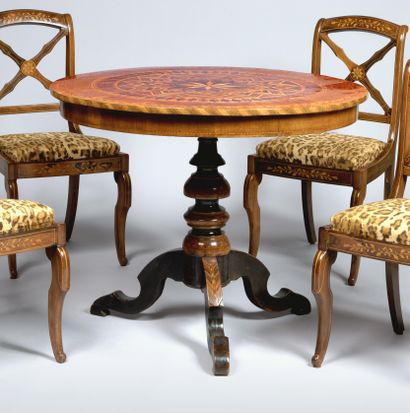 Pedestal table in veneer and marquetry, the...