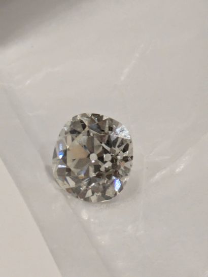 Platinum-set ring set with three small falling...