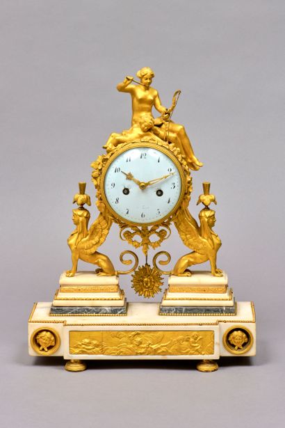 Gilt bronze, white marble and gray marble...