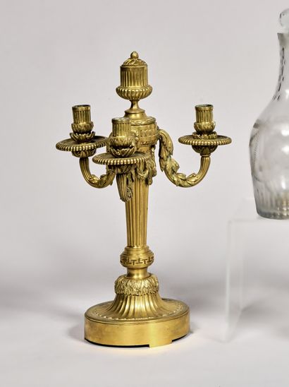 Large ormolu torch, chased with canals, gadroons...