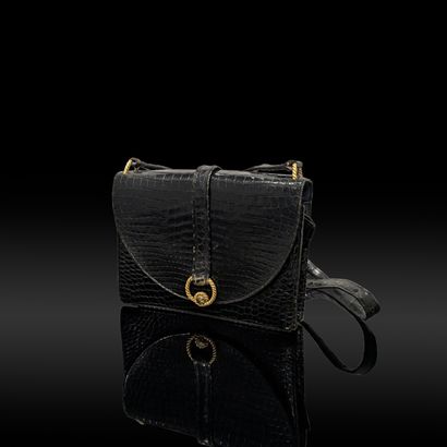 HERMES Paris. Black patent crocodile leather...