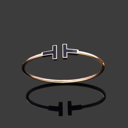 TIFFANY. 18k (750) yellow gold, each end...