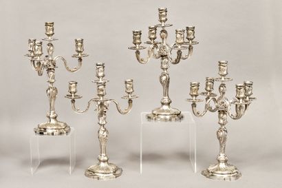 Suite of four large silvered bronze torches...