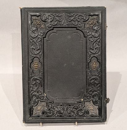 Black chagrin desk pad with central reserve...