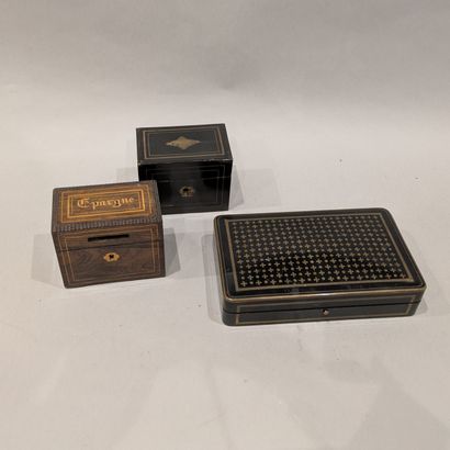 Box in blackened wood with brass moldings...