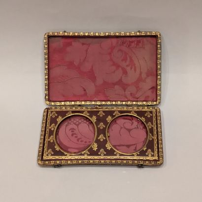A burgundy morocco miniature case gilded...