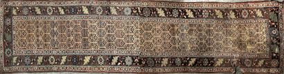 Small Oriental wool carpet with a cruciform...