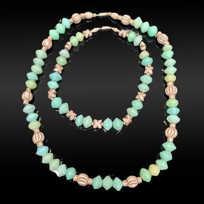 Two necklaces of turquoise glass beads and...