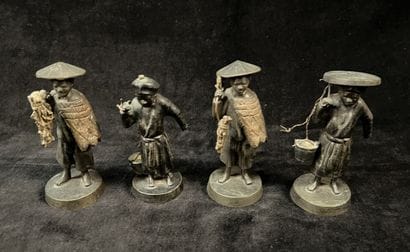 Four patinated bronze statuettes depicting...