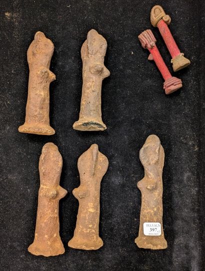Five anthropomorphic terracotta statuettes....