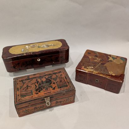 Japan. Two rectangular boxes in burgundy...