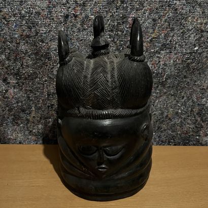 SOWEI SKULL MASK depicting a woman's head...