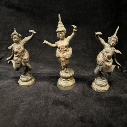 Three bronze statuettes of dancing girls....