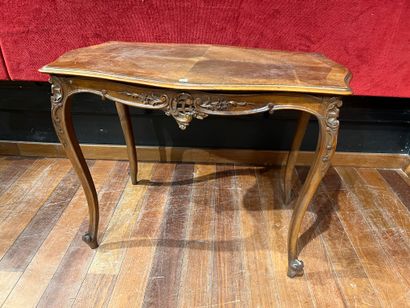 Walnut coffee table, the top is curved, the...