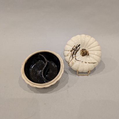 China. Stoneware spice box featuring a cucurbit....