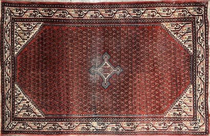 Small Oriental wool carpet with a cruciform...