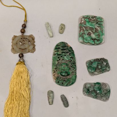 Jades or jadeites: - plaque carved in relief...