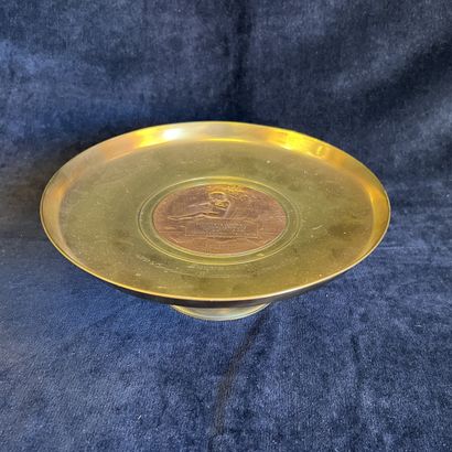 Bronze cup, the center decorated with a copper-plated...