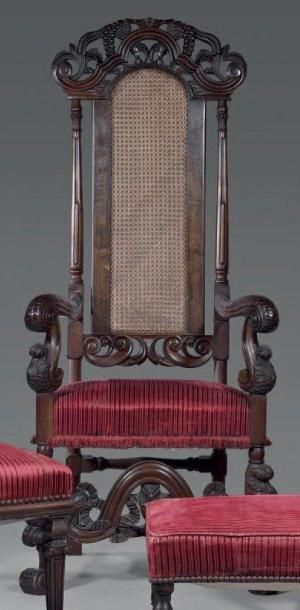 Fauteuil en acajou à haut dossier sculpté...