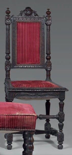 Chaise en chêne mouluré et sculpté de frises...