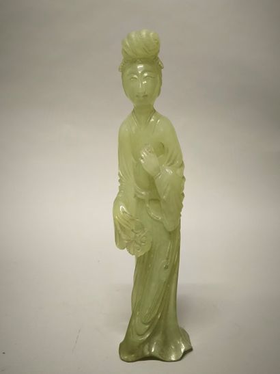CHINA - 20th century. Serpentine group, standing...