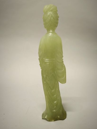 CHINA - 20th century. Serpentine group, standing...
